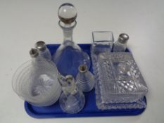 A tray of glass decanter and cheese dish etc