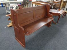 An antique style pine pew