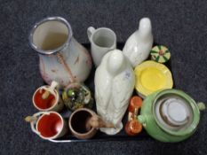 A pair of West German pottery nude mugs together with ceramic dove ornaments etc