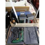 A crate of tools, spirit level,