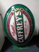 A Thomas Caffrey Irish Ale advertising sign