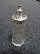 A silver topped sugar castor