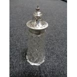 A silver topped sugar castor