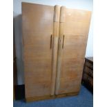 An early twentieth century oak double door wardrobe CONDITION REPORT: Locked and