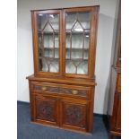 An Edwardian walnut secretaire bookcase CONDITION REPORT: 205cm high by 122cm wide