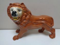 Three nineteenth century Staffordshire lion figures