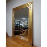 A contemporary gilt framed bevelled mirror