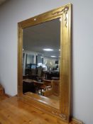 A contemporary gilt framed bevelled mirror