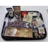 A quantity of costume jewellery, brooches,