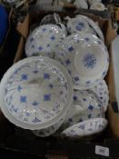 A box of blue and white York Town dinner ware and tea china.