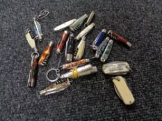 Twenty miniature pocket / pen knives