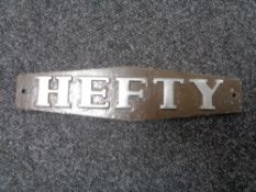 A vintage motor car badge - HEFTY