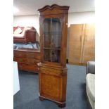 A reproduction walnut corner display cabinet CONDITION REPORT: Height 187.