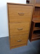 A modern three drawer filing chest together with a four drawer chest