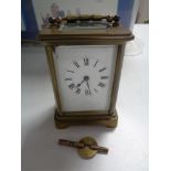 A twentieth century brass carriage clock with key CONDITION REPORT: Loss to enamel