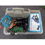 A crate of tools, electric drill, jigsaw, router, electric planer,