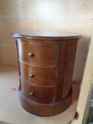 A Willis and Gambier cylindrical three drawer chest CONDITION REPORT: Height 60.