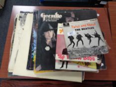 A quantity of lps and singles - Beatles, Beach Boys,