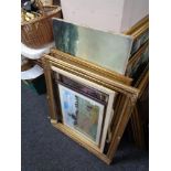 Two gilt picture frames, oil on canvas depicting boats,