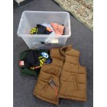 A crate of new and un-used clothing, fleece,