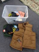 A crate of new and un-used clothing, fleece,