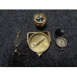 A pair of antique spectacles together with a brass compass,