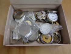 A box of pocket watch parts and cases