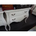 A reproduction continental style two drawer white chest of drawers CONDITION REPORT: