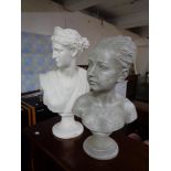 A white contemporary bust and one other.