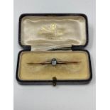 A 9ct gold aquamarine bar brooch, width 52.6 mm.