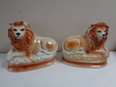 A pair of nineteenth century Staffordshire lion figures
