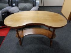 A nineteenth century mahogany kidney shaped table with gallery under stretcher CONDITION