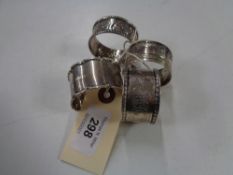 Four antique silver napkin rings, 84.3g.