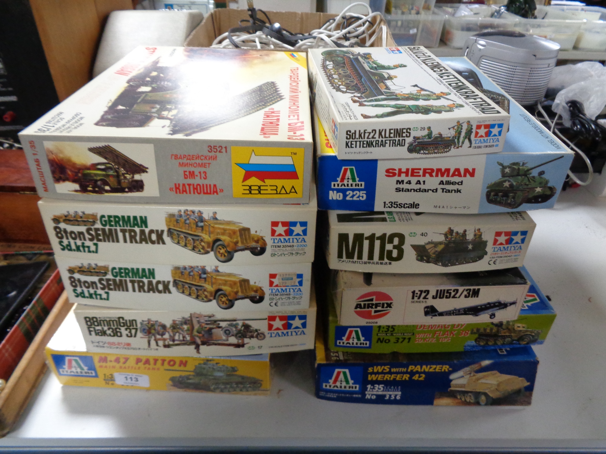 Eleven model kits to include Airfix, Tamiya etc,