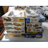 Eleven model kits to include Airfix, Tamiya etc,