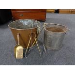 A large copper log bin together with a metal fire bucket and fire tongs etc