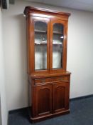 A nineteenth century mahogany bookcase, height 212 cm x width 88 cm, depth 41 cm.