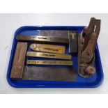 A tray of Rabone boxwood ruler, brass mounted spirit levels,