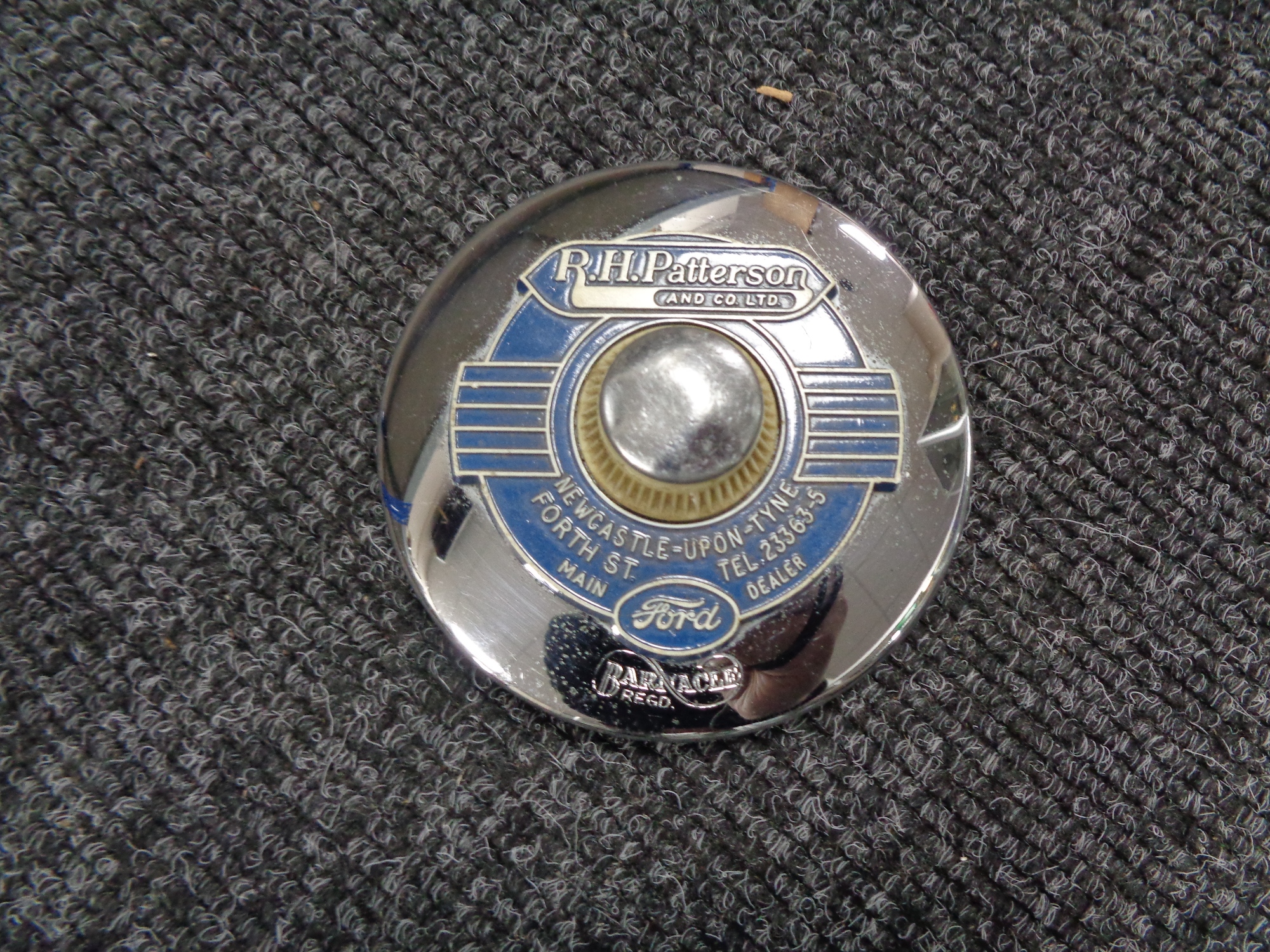 A vintage motor car badge - R H Patterson Ford Newcastle upon Tyne