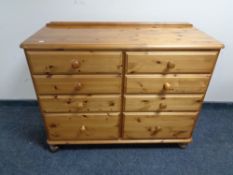 A Ducal pine eight drawer chest