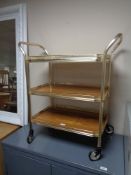 A mid century metal three tier trolley