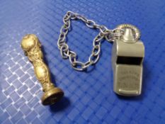 An LNER Thunderer whistle together with an antique seal and chain