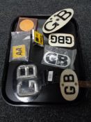 A collection of badges including GB,