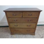 An Edwardian inlaid mahogany chest of five drawers