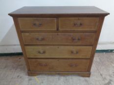 An Edwardian inlaid mahogany chest of five drawers