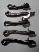 Five late 19th century bull head tin openers