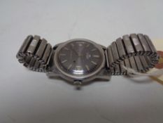 A vintage Audax automatic 21-jewel gent's stainless steel wristwatch, on expanding bracelet strap.