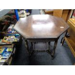 An Edwardian stained beech occasional table