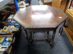 An Edwardian stained beech occasional table