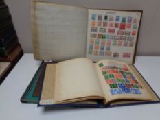 Four booklets and albums of stamps ,